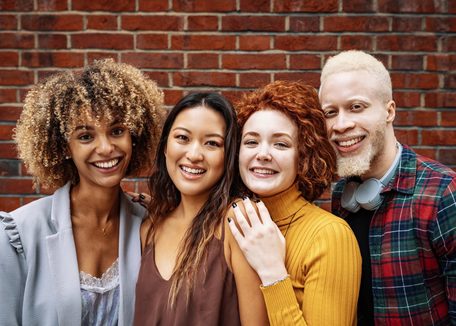 Diverse millennial friends smiling